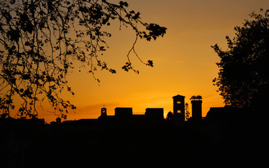 Lucca golden sunset skyline with ancient medieval towers - obrazy, fototapety, plakaty