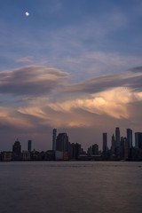 Amazing sky behind New York City skyline viewed from Hoboken, New Jersey