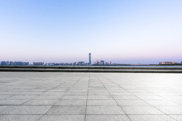 empty square with modern office building in urban