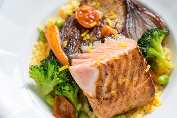 Grilled Salmon Fillet with Vegetables on White Plate