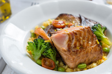 Grilled Salmon Fillet with Vegetables on White Plate