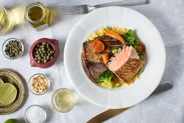 Grilled Salmon Fillet with Vegetables on White Plate