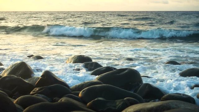 waves on the shore of Batanes at sunrise