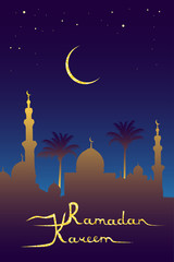 Ramadan kareem golden glitter message and mosque silhouette