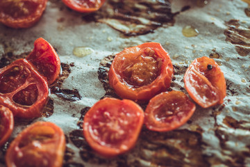 Rustic Style Roasted Cherry Tomatoes on White Baking Parchment