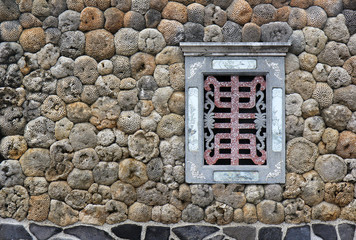 Traditional house with window on coral stones on the Penghu Island, Taiwan
