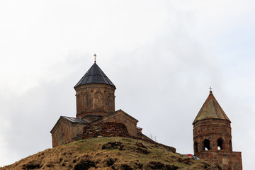 Gergeti Trinity Church (Tsminda Sameba), Holy Trinity Church near the village of Gergeti in Caucasian mountains, Georgia