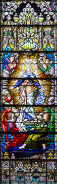 Salt Lake City, Utah, US. 31/08/2017. Stained glass in The Cathedral of the Madeleine depicting the Assumption of Virgin Mary into heaven.