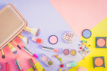 Colorful make up flat lay scene