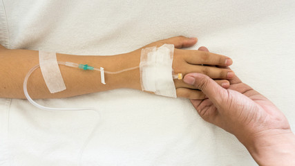 Woman patients on the bed have injection saline