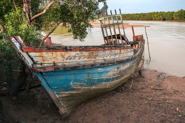 Old boat aground