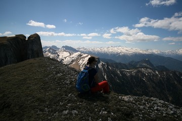 Fototapeta premium Tourist admires the mountains in Adygea
