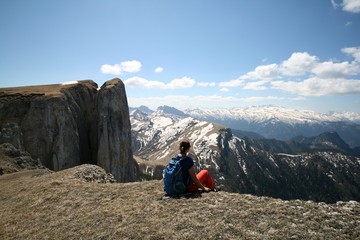 Tourist admires the mountains in Adygea