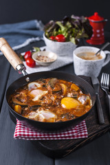 Shakshuka, Fried Eggs in Tomato Sauce for Easter Brunch.