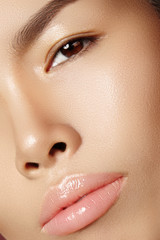 Beautiful asian woman with fresh daily makeup. Vietnamese beauty girl in spa treatment. Close-up with Clean Skin on Face