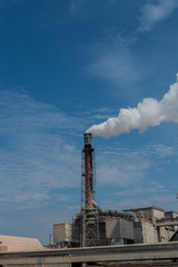 Industrial area in a sea port, harbor - smoke pollution