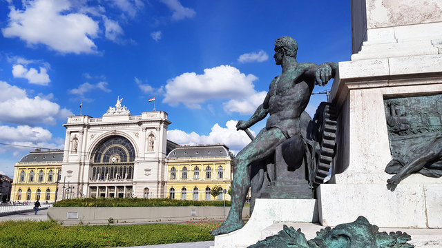 Keleti train or railway station, the eastern railway terminal in Baross square Budapest, Hungary with statue of Garbor Baross in foreground.