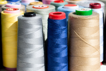 A set of colorful threads for sewing. Close up