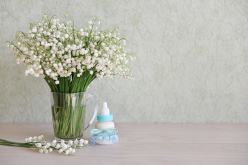 decorative baby bottle with milk are on the table. For a baby shower celebrate. for thematic birthday decor