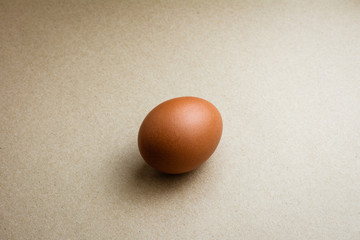 Brown chicken eggs on recycled craft paper