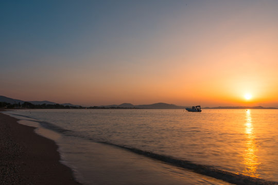 Sunrise reflection; Marathonas beach, Athens area, Greece