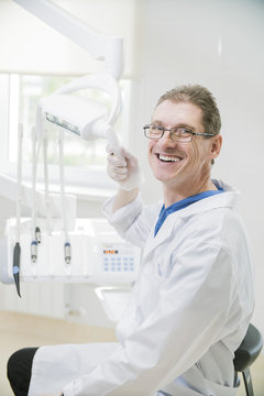 doctor dentist in the medical office, man