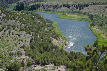 The water flowing rapids of the green river in browns park. 
