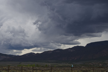 The rolling rain strom of the brown par plains in utah