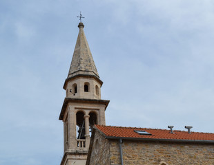 The top of the bell tower against the sky. Orthodox Church. Montenegro