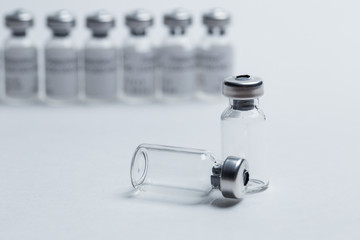 vial and syringe for vaccine on white background closeup