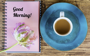 Pink Notebook,Pink Tulip and Cup of Coffee for Good Morning  .Spring Morning Concept