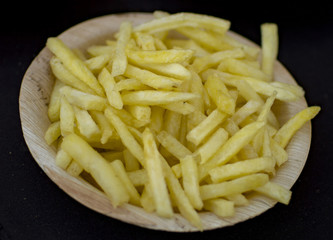 French fries of yellow base color in plate