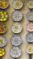 typical ceramic dishes in the Souvenirs shop in the main street of Taormina, Sicily, Italy