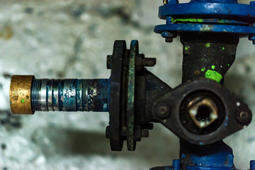 Old metal pipe connecting union close