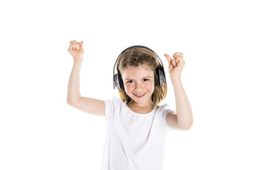 Portrait of a cute 7 years old girl Isolated over white background with headphone