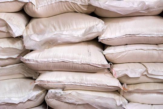 Many sugar bags stacked at modern winery