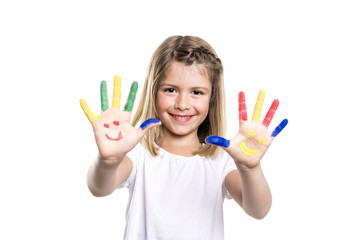 smiling girl with the palms painted by a paint. Isolated on white background