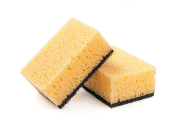 Two yellow sponge for kitchen isolated on white background.