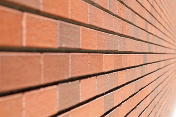Brick wall texture close-up background. Selective focus.