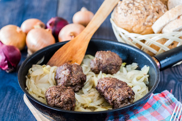 Meatballs stuffed with onion