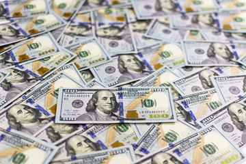 Pile of new design US dollar bills as background. Top view point.