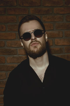 bearded man in sunglasses