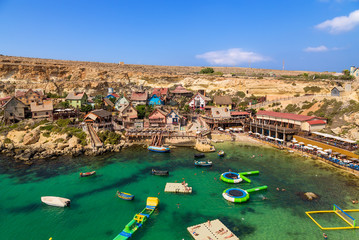 Fototapeta na wymiar Mellieha, Malta. Popeye Village (entertainment complex) on the shore of Anchor Bay