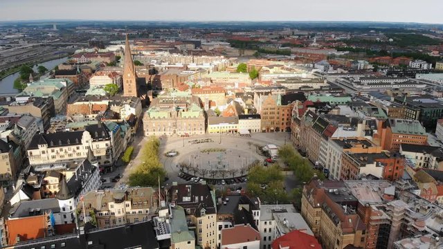 Aerial view of cityscape of Malmo, capital city of Scania, historic center of city, brightly coloured houses, Stortorget Square - landscape of Sweden from above, Scandinavia, Europe, 4k UHD