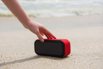 Female hand touch portable speaker