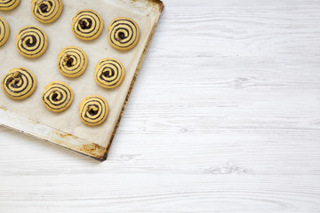 Freshly baked cookies on a baking sheet, top view. Copy space.