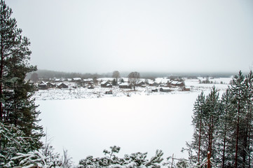 Winter russian river village