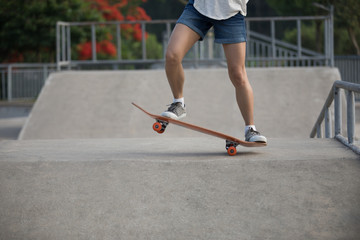 skateboarder skateboarding on skatepark