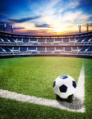 Ball on soccer stadium championship concept