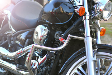 Chrome plated detail of a cool motorcycle. Closeup motorbike background.